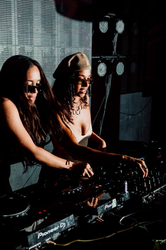 Two Spin Lab DJs mixing back to back